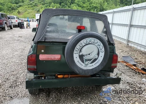 1996 Geo Tracker из США, поврежденный, VIN 2CNBJ1862T6919221